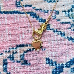 Atelier McChang Hand Holding Heart Necklace in Gold